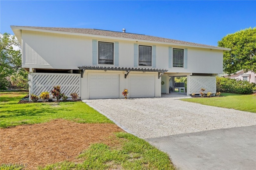 Welcome to your private retreat in the sought-after Dunes Golf & - Beach Home for sale in Sanibel, Florida on Beachhouse.com