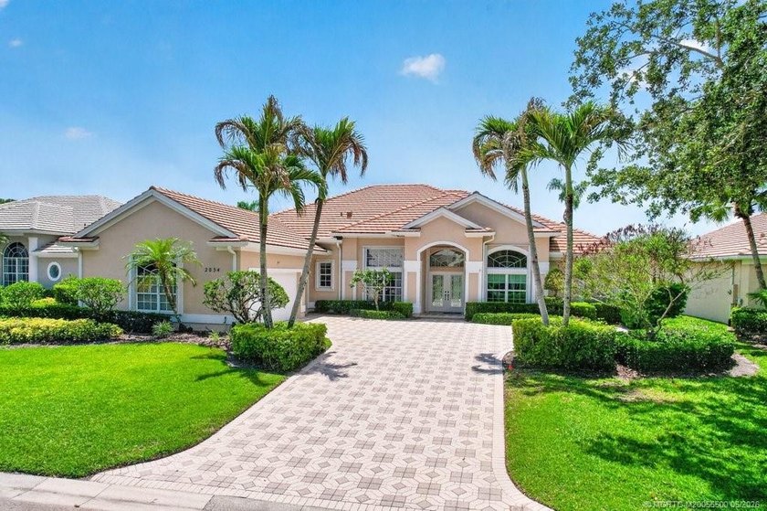 Perfectly positioned on the 11th Fairway, this well maintained - Beach Home for sale in Palm City, Florida on Beachhouse.com
