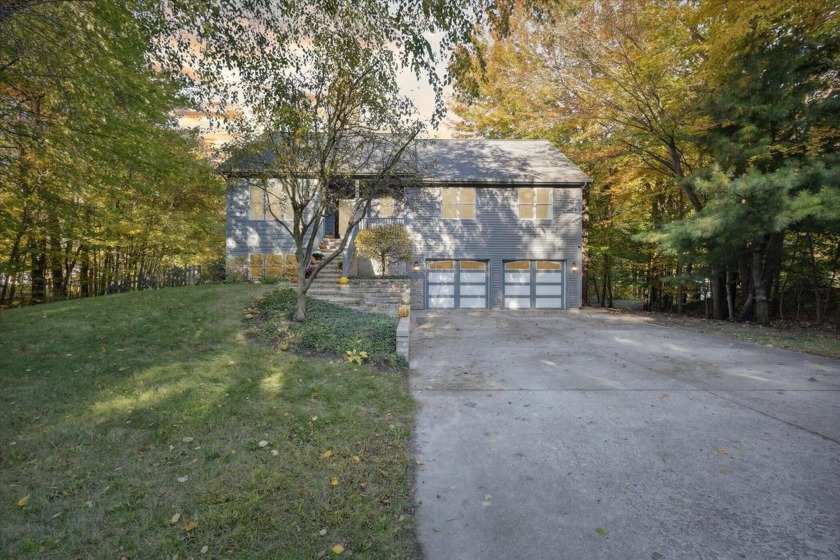 Nestled on 1.1 serene acres, this 4-bedroom, 3-bath beauty - Beach Home for sale in Holland, Michigan on Beachhouse.com