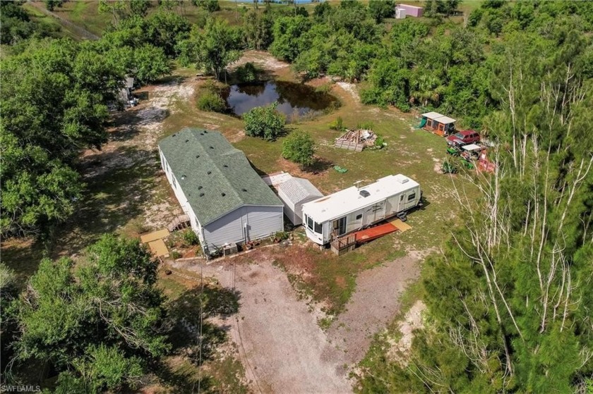 Discover the charm of this expansive one-acre agricultural - Beach Home for sale in Punta Gorda, Florida on Beachhouse.com