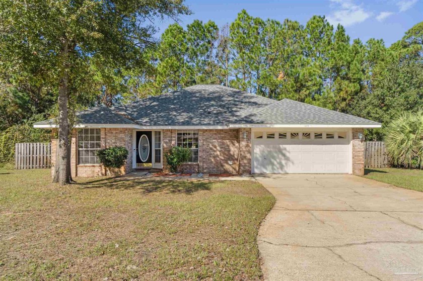 Nestled in the heart of Gulf Breeze, this inviting home - Beach Home for sale in Gulf Breeze, Florida on Beachhouse.com