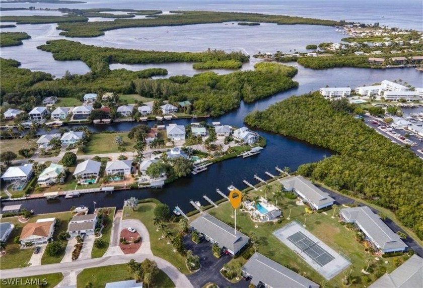 Discover the charm of island living in this turnkey condo - Beach Condo for sale in Bokeelia, Florida on Beachhouse.com