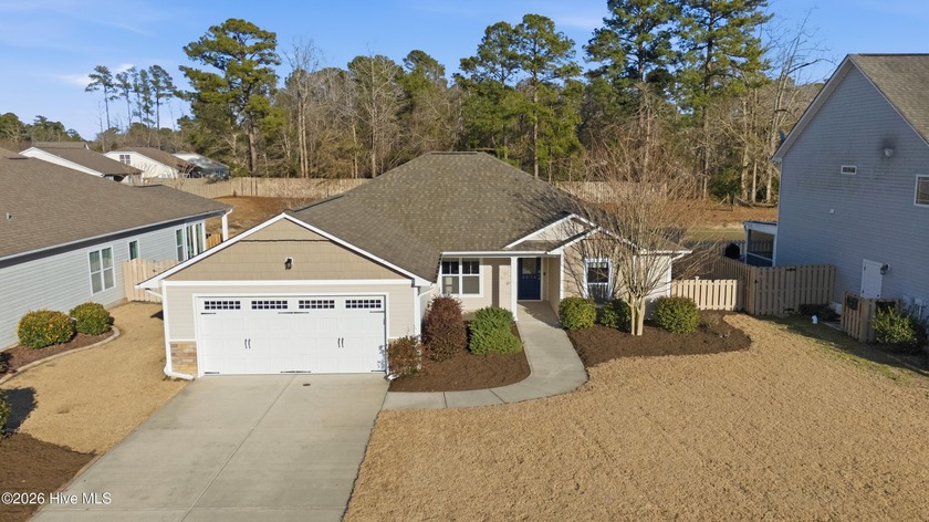 Enjoy peaceful pond views and effortless one-level living in - Beach Home for sale in Leland, North Carolina on Beachhouse.com