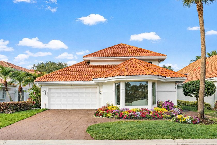 A striking, newly renovated two-story residence showcasing - Beach Home for sale in Boca Raton, Florida on Beachhouse.com