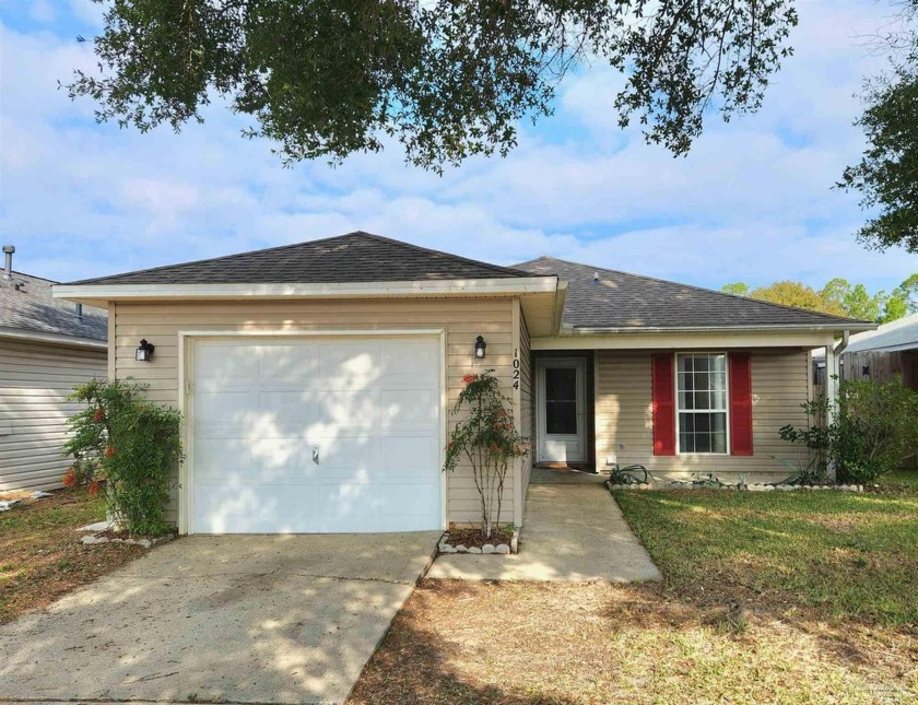 Move in ready. Beautiful old oak greets you at front entrance - Beach Home for sale in Pensacola, Florida on Beachhouse.com