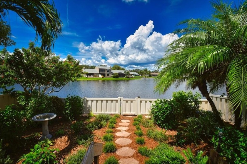 RARELY AVAILABLE WIDE OPEN LAKEVIEW CORNER VILLA -- STUNNING SUN - Beach Home for sale in St. Petersburg, Florida on Beachhouse.com