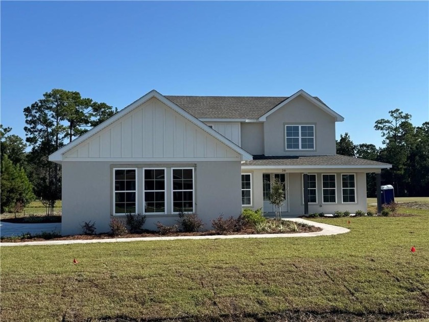 This newly constructed home in Ratcliff Lake offers a spacious - Beach Home for sale in Brunswick, Georgia on Beachhouse.com