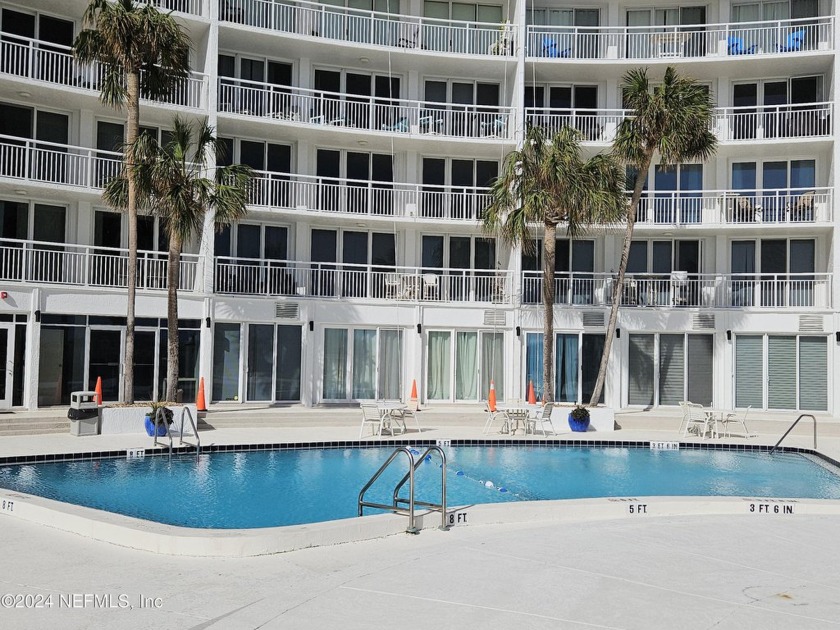 With spectacular views and appointments, this end unit is - Beach Condo for sale in Jacksonville Beach, Florida on Beachhouse.com