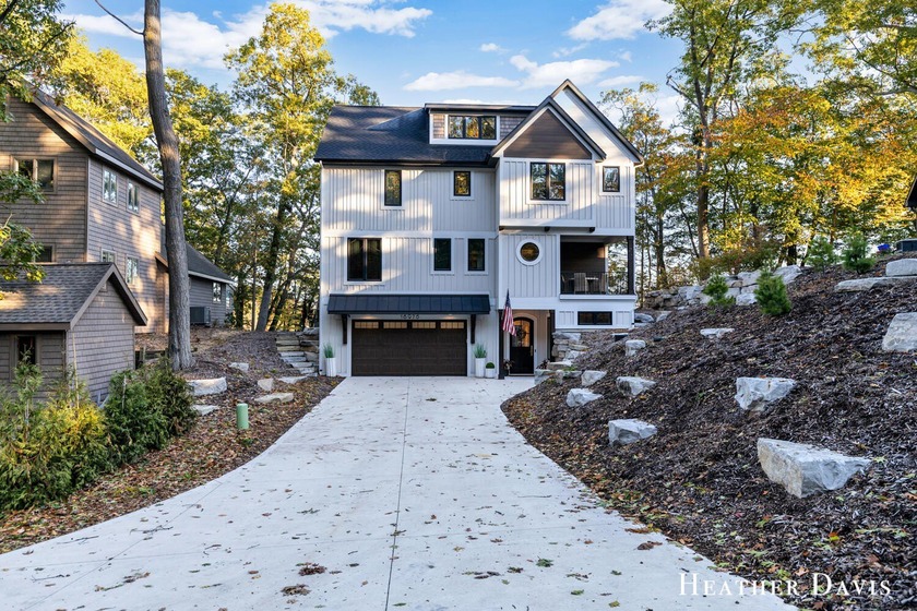 Step into turnkey luxury with this stunning new-construction - Beach Home for sale in West Olive, Michigan on Beachhouse.com