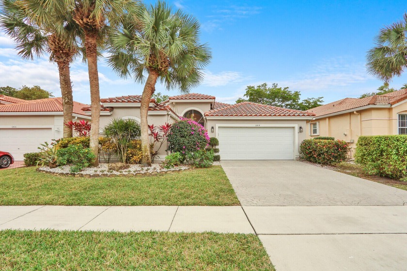Welcome to this lovingly maintained single-family home nestled - Beach Home for sale in Boynton Beach, Florida on Beachhouse.com