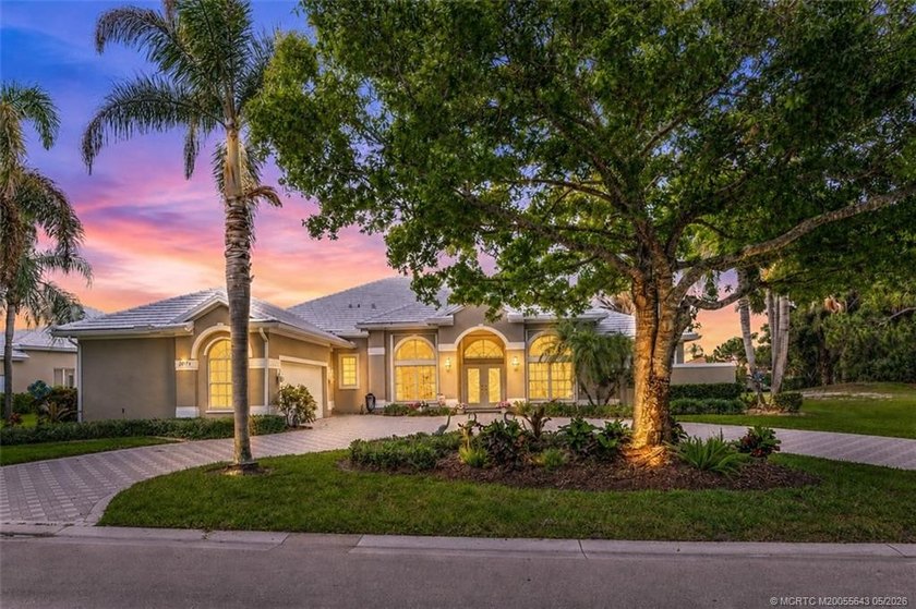 Elegant Monarch Country Club estate on a premier lot with water - Beach Home for sale in Palm City, Florida on Beachhouse.com