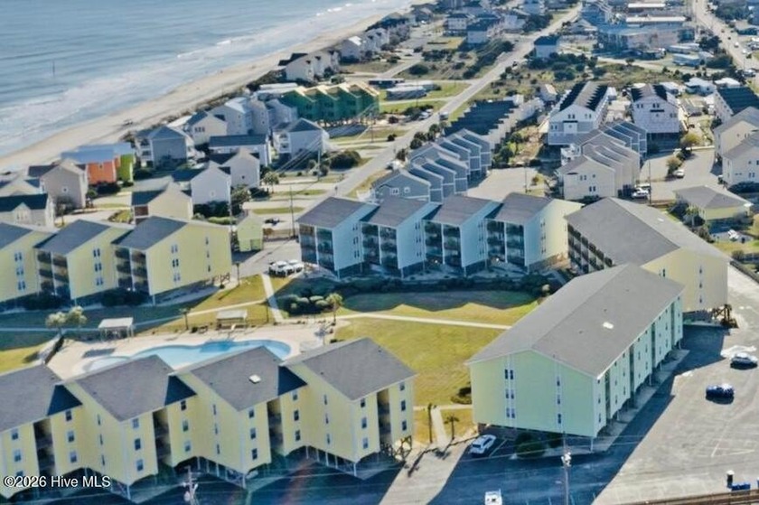 Discover the perfect coastal retreat or income-producing - Beach Condo for sale in Surf City, North Carolina on Beachhouse.com