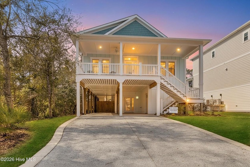 Indulge in refined coastal living within this Parade of Homes - Beach Home for sale in Oak Island, North Carolina on Beachhouse.com