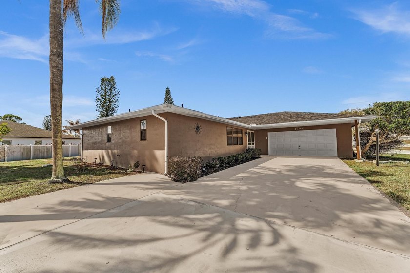 Not your average Florida home. This solid frame construction on - Beach Home for sale in Port Saint Lucie, Florida on Beachhouse.com