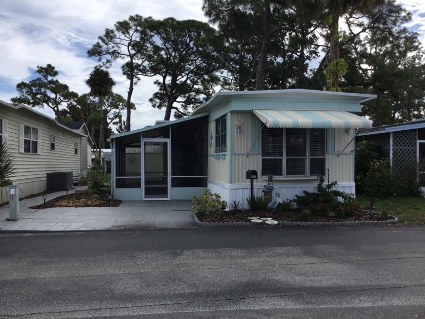 Super cute two bedroom, 1 bath home in a quiet 55+ park in - Beach Home for sale in Titusville, Florida on Beachhouse.com