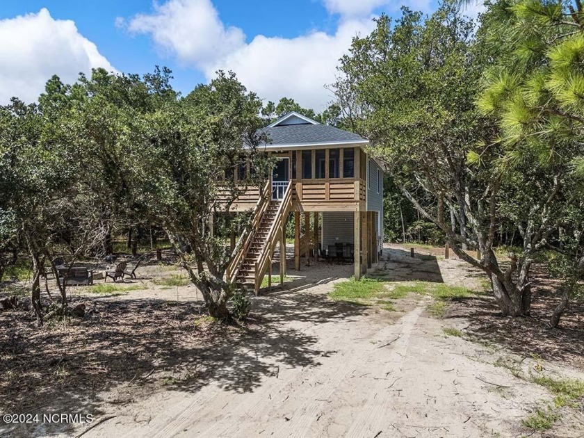 Welcome to your coastal sanctuary, nestled in the serene North - Beach Home for sale in Corolla, North Carolina on Beachhouse.com