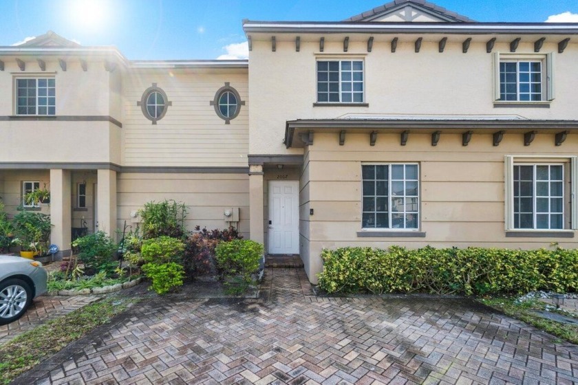 Step into this elegant two-story townhome, perfectly situated in - Beach Townhome/Townhouse for sale in Riviera Beach, Florida on Beachhouse.com
