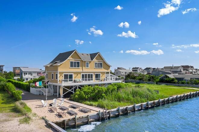 The line between land and water gets blurred in this impeccably - Beach Home for sale in Westhampton, New York on Beachhouse.com