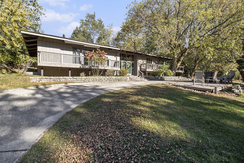 This ONE OF A KIND mid-century modern home with deeded lake - Beach Home for sale in Manistee, Michigan on Beachhouse.com