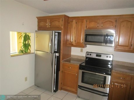 THIS IS A 2 BEDROOM 1 AND A HALF BATH. THE KITCHEN HAS BEEN - Beach Condo for sale in Sunrise, Florida on Beachhouse.com