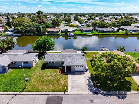 Beautiful Sunrises and Sunsets await you - with water views as - Beach Home for sale in Holiday, Florida on Beachhouse.com