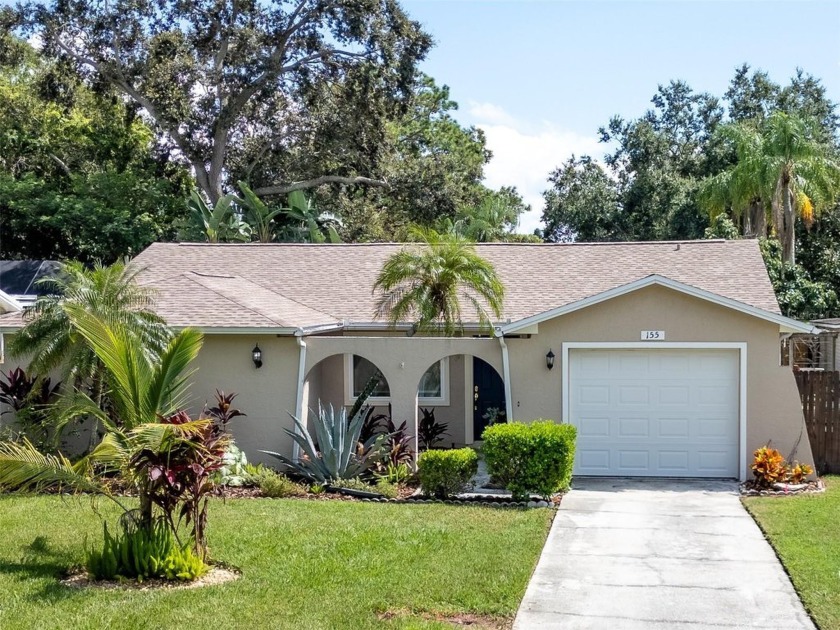 Welcome to this exceptional corner lot home in a vibrant golf - Beach Home for sale in Safety Harbor, Florida on Beachhouse.com