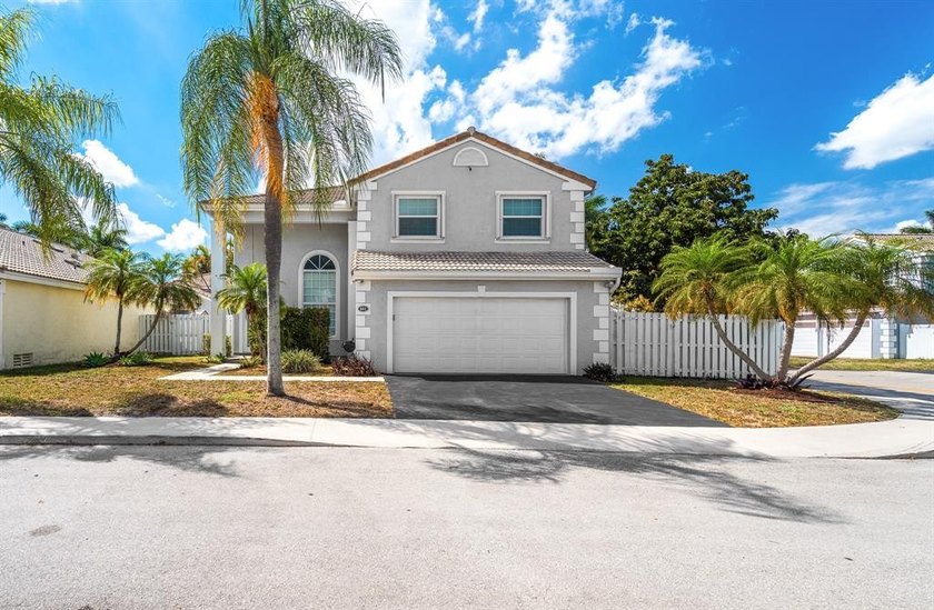 Beautifully and substantially updated 3BR/2.5BA home situated on - Beach Home for sale in Davie, Florida on Beachhouse.com