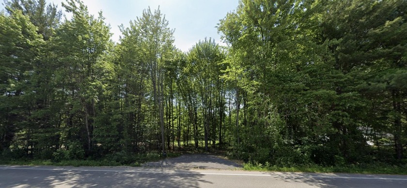 An amazing opportunity awaits to build your dream home in the - Beach Lot for sale in Spring Lake, Michigan on Beachhouse.com