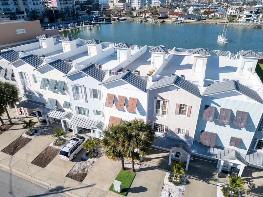 Experience luxurious waterfront living with this exceptional - Beach Townhome/Townhouse for sale in Clearwater Beach, Florida on Beachhouse.com