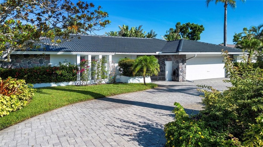 Nestled on a peaceful street in the prestigious and highly - Beach Home for sale in Sarasota, Florida on Beachhouse.com