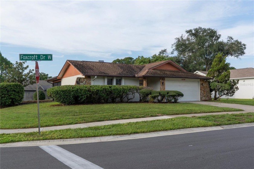 PRICE REDUCTION!! - LOCATED ON A  1/4  ACRE CORNER LOT in the - Beach Home for sale in Palm Harbor, Florida on Beachhouse.com