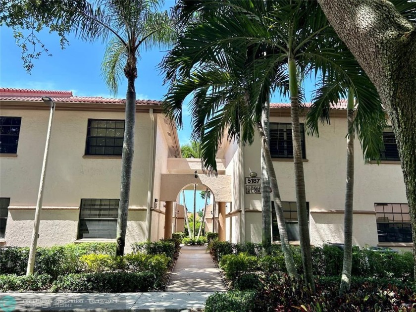 Welcome home to this first floor Grandi Model unit with a canal - Beach Condo for sale in Boynton Beach, Florida on Beachhouse.com