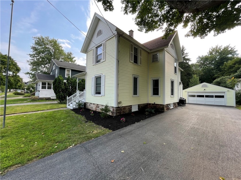 Nestled in a lovely neighborhood, this beautifully restored - Beach Home for sale in Sodus, New York on Beachhouse.com