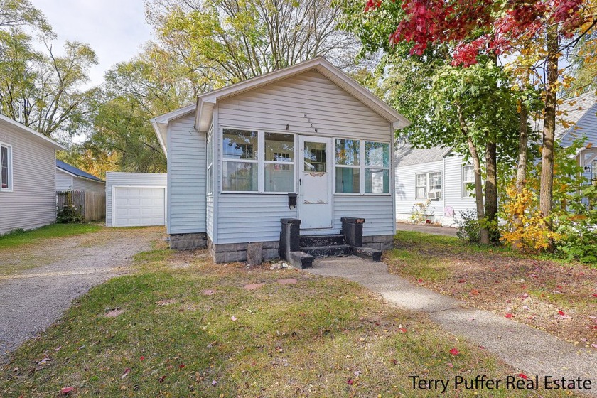 Great first-time home or income property! This charming - Beach Home for sale in Muskegon, Michigan on Beachhouse.com