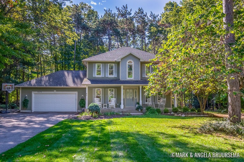 Welcome home to this beautifully updated residence in the - Beach Home for sale in Grand Haven, Michigan on Beachhouse.com