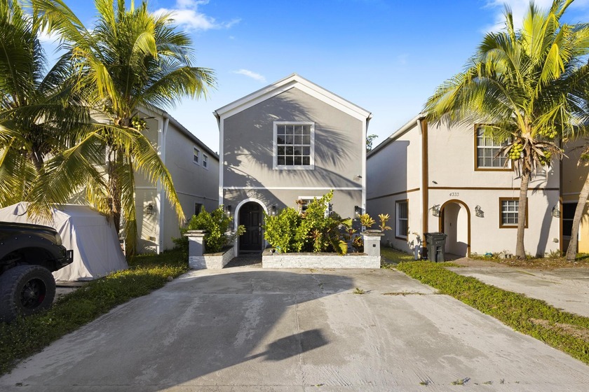 Welcome to this metal roof home, here, located in Lake Worth - Beach Townhome/Townhouse for sale in Lake Worth Beach, Florida on Beachhouse.com