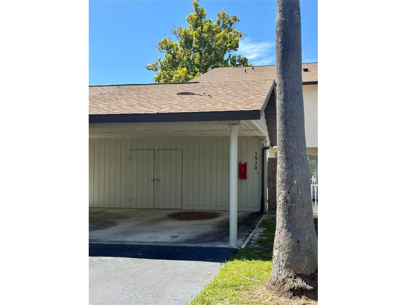 Welcome to Whitney Lakes, where style meets serenity. This - Beach Townhome/Townhouse for sale in Clearwater, Florida on Beachhouse.com