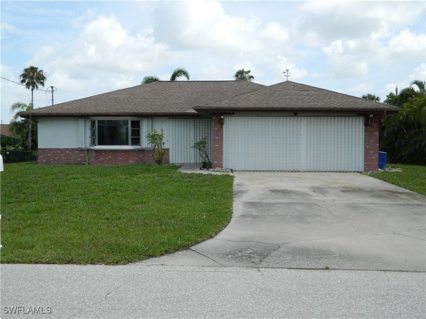 This home is located on wide Pie Shaped Lot with a wide canal - Beach Home for sale in Fort Myers, Florida on Beachhouse.com