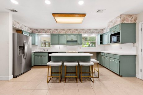 This beautifully updated home features an open concept kitchen - Beach Home for sale in Fort Walton Beach, Florida on Beachhouse.com