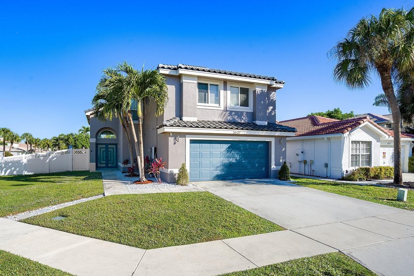 Stunning corner-lot home in the sought-after, gated community of - Beach Home for sale in Boynton Beach, Florida on Beachhouse.com
