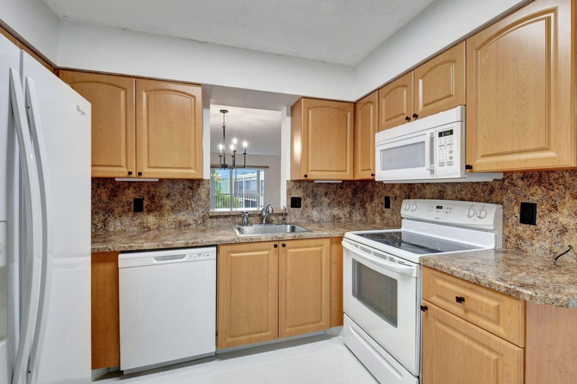 Move-in Ready! Discover this beautifully maintained corner - Beach Condo for sale in Delray Beach, Florida on Beachhouse.com