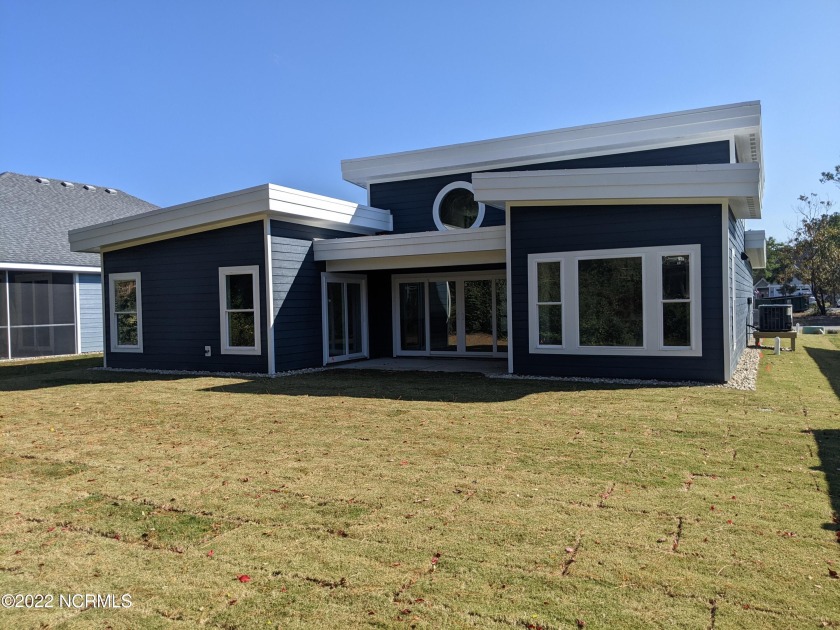 High-end, contemporary elements greet you as you enter the - Beach Home for sale in Kill Devil Hills, North Carolina on Beachhouse.com