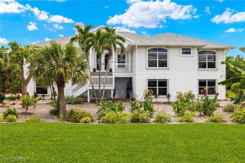 Across from the beach, hear the surf from your solar-heated pool - Beach Home for sale in Sanibel, Florida on Beachhouse.com