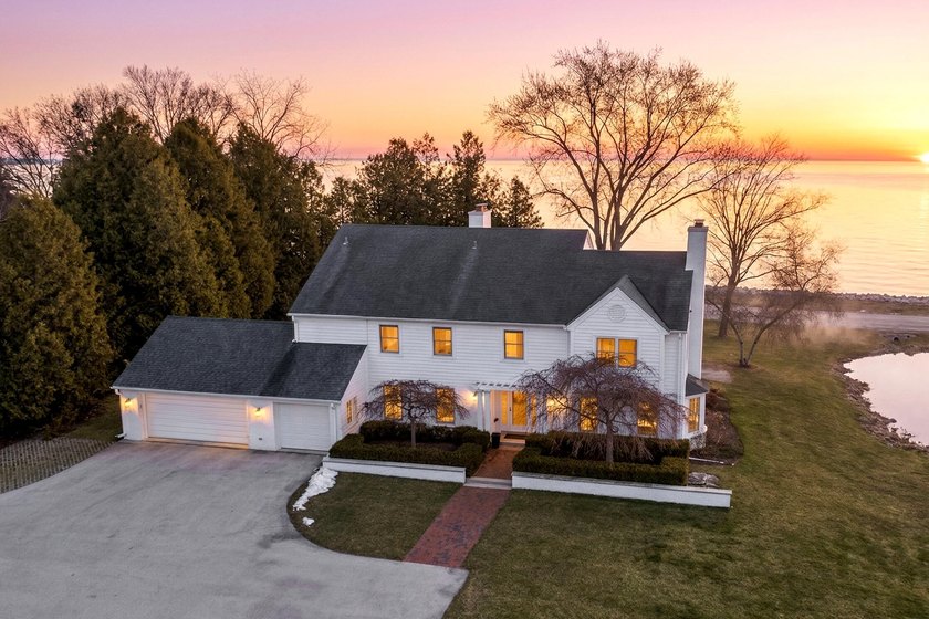 Tucked along coveted North Beach Drive in Fox Point, this - Beach Home for sale in Fox Point, Wisconsin on Beachhouse.com