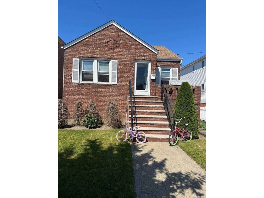 Charming Raised cape nestled in Old Howard Beach. Three bedrooms - Beach Home for sale in Howard Beach, New York on Beachhouse.com