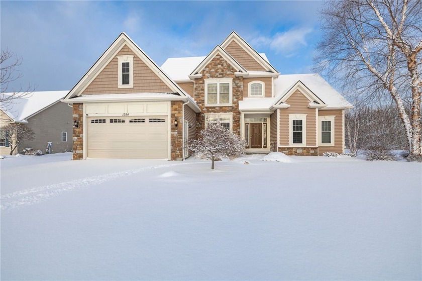 Set on a quiet, wooded lot in Webster, this 4-bedroom, 2.5-bath - Beach Home for sale in Webster, New York on Beachhouse.com