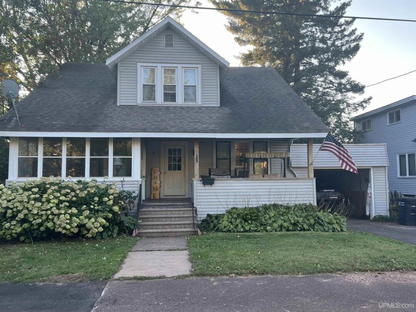 Welcome to this lovely 4-bedroom, 1-bath home that perfectly - Beach Home for sale in Ironwood, Michigan on Beachhouse.com