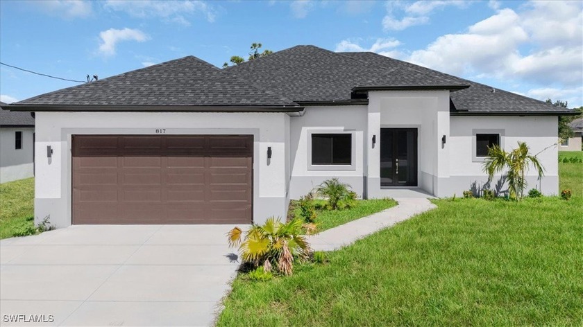 Stunning new construction romana 2 car garage model in desirable - Beach Home for sale in Cape Coral, Florida on Beachhouse.com