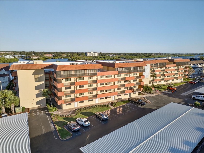 Experience refined coastal living in this beautifully updated - Beach Condo for sale in Indian Shores, Florida on Beachhouse.com