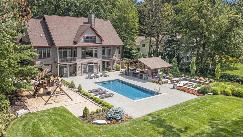 Experience luxury lakeside living on Lake Macatawa with this - Beach Home for sale in Holland, Michigan on Beachhouse.com